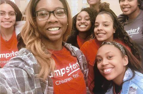 Jumpstart staff smiling for a selfie photo.