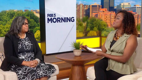 Dr. Kisha Lee giving an television interview with Fox 5 News.